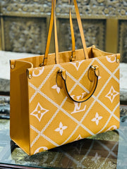 Louis Vuitton (on the go) Tote Bag