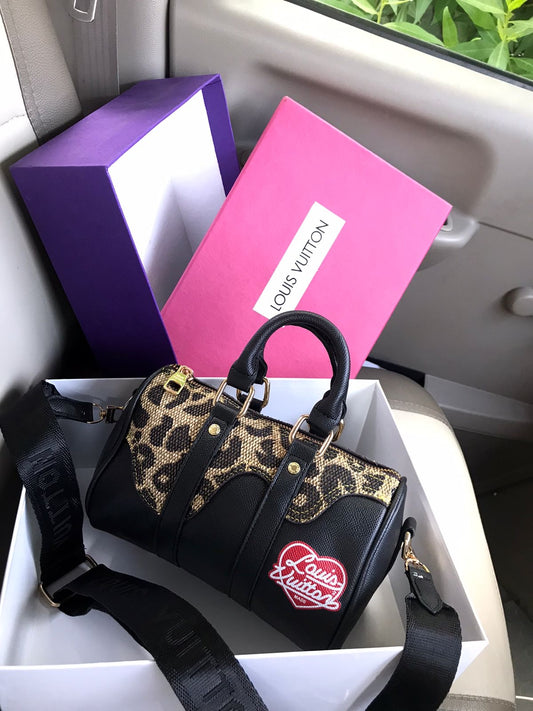 Louis Vuitton Leopard Duffle Bag