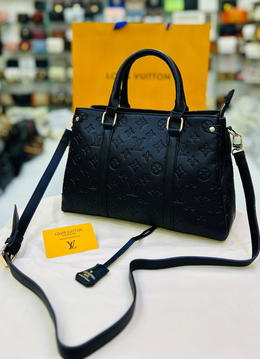 Louis Vuitton Leather 'LV' Embossed Handbag