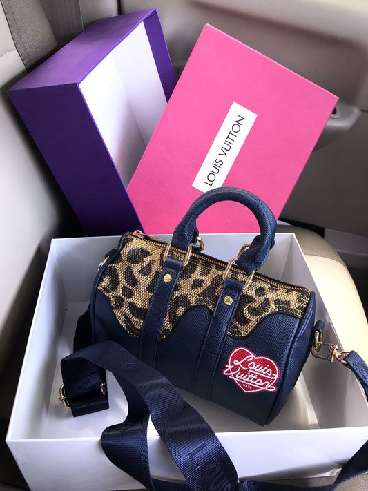 Louis Vuitton Leopard Duffle Bag