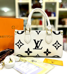 Statement Medium Handbag by Louis Vuitton