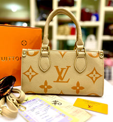 Statement Medium Handbag by Louis Vuitton