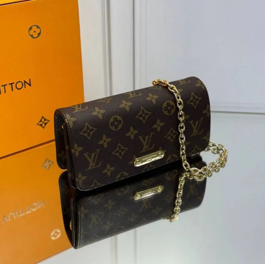 Louis Vuitton Monogram Lilly WOC Clutch Bag